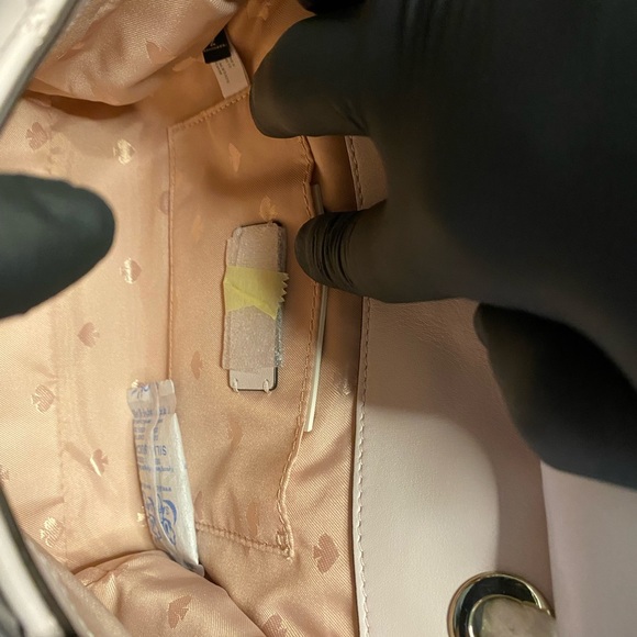 Small chalk pink Natalia cross body bag with tags attached and packaged. - Picture 6 of 6